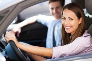 Couple smiling in a car